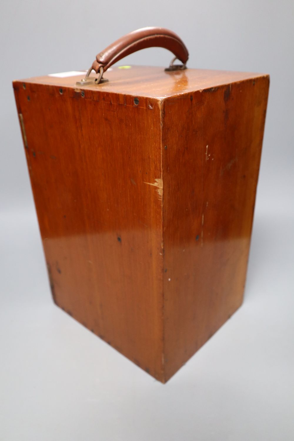 A cased microscope, case height 35cm
